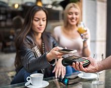 Girl paying with digital wallet